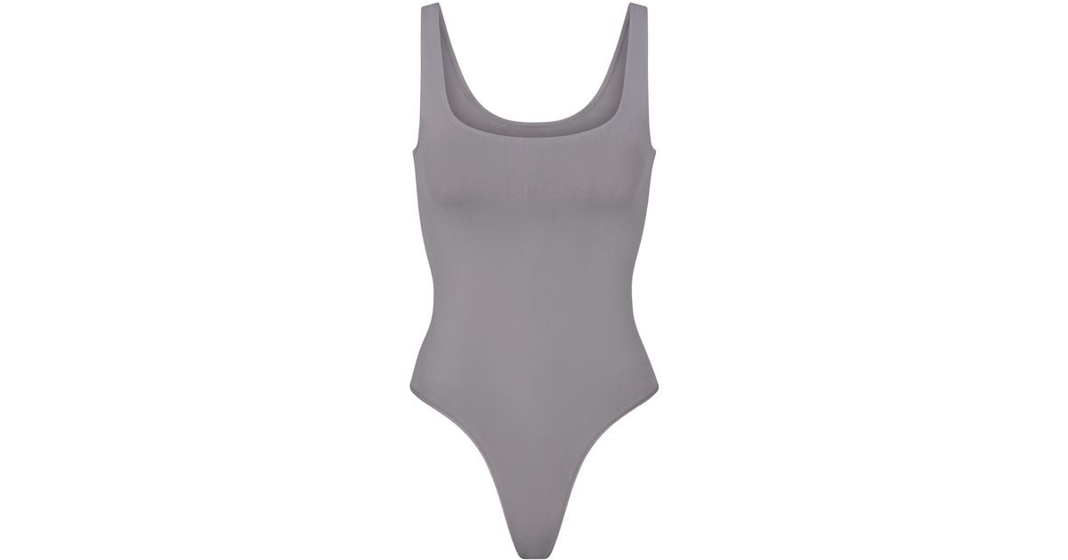 Skims Soft Smoothing Thong Bodysuit in Gray Lyst