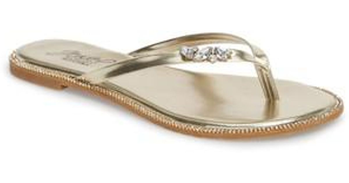 gold embellished flip flops