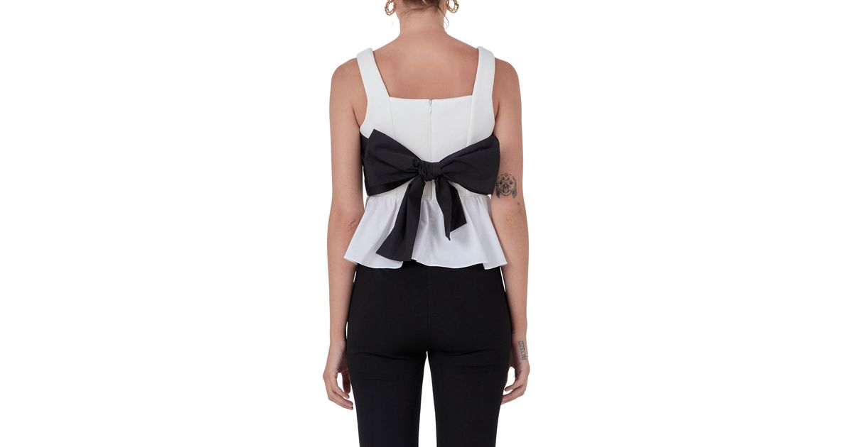 Endless Rose Bow Back Peplum Top in Black Lyst