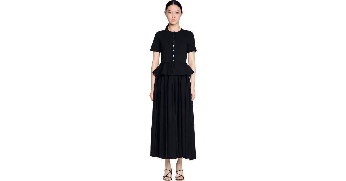 Sandro Peplum Knit Maxi Dress in Black | Lyst