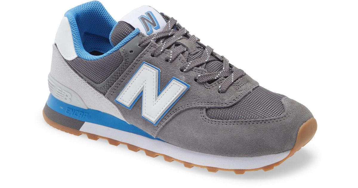 new balance 574 black with faded cobalt