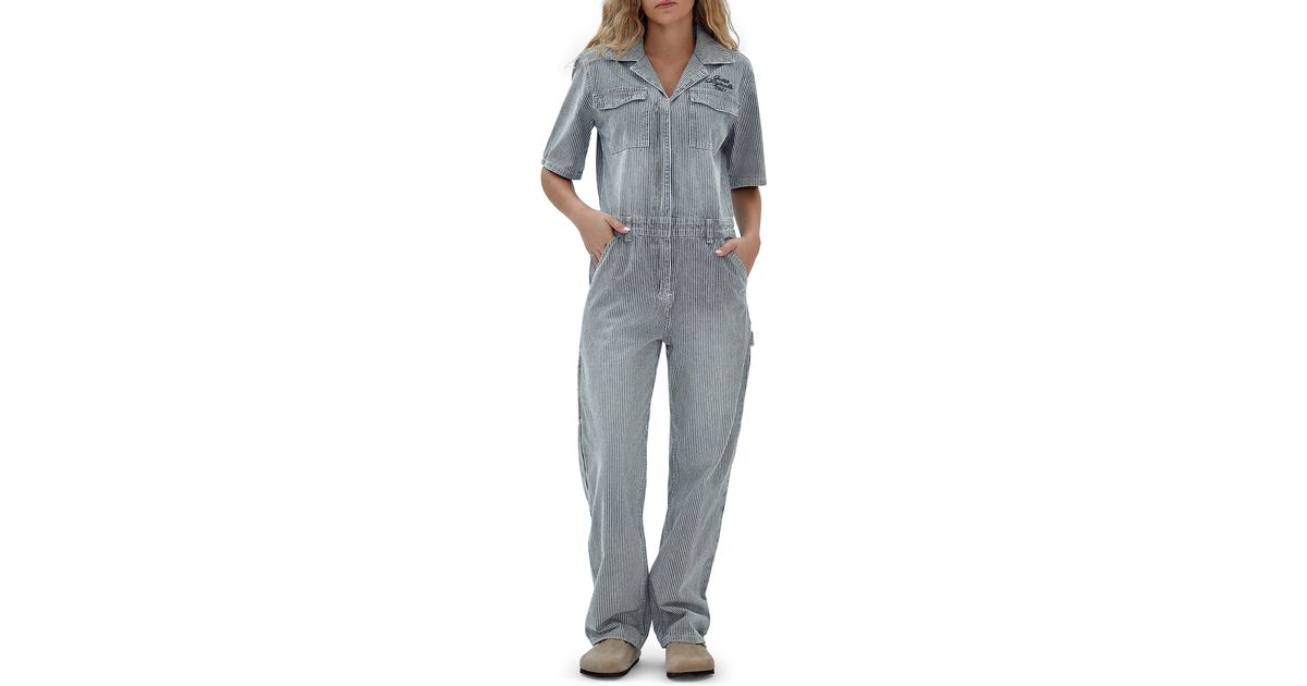 GUESS Halter Denim Jumpsuit In Picture Show Wash, $138 | GUESS | Lookastic