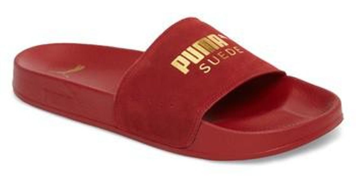 puma flip flops red