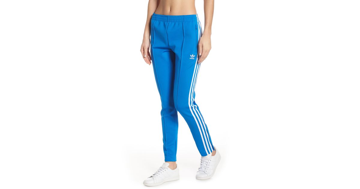 adidas sst track pants blue