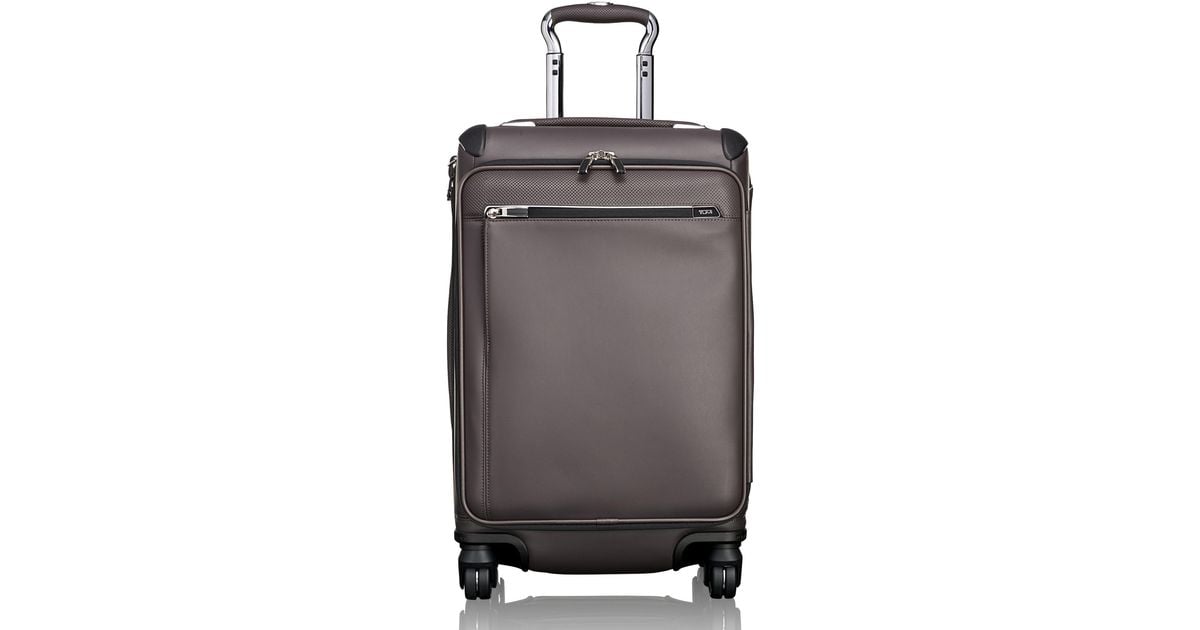 tumi arrive international carry on