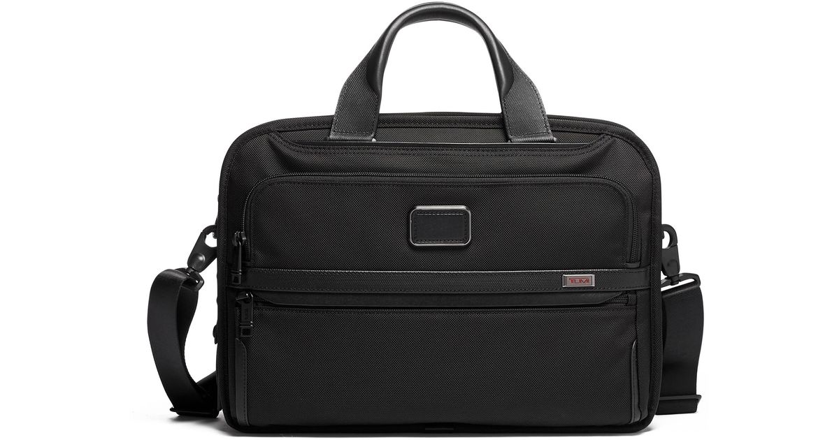tumi triple compartment brief