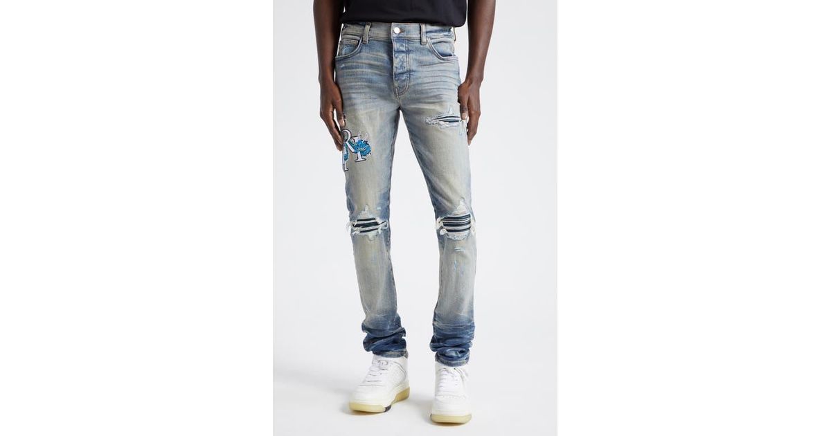 Amiri Mx1 Dragon Lunar New Year Ripped & Patched Jeans in