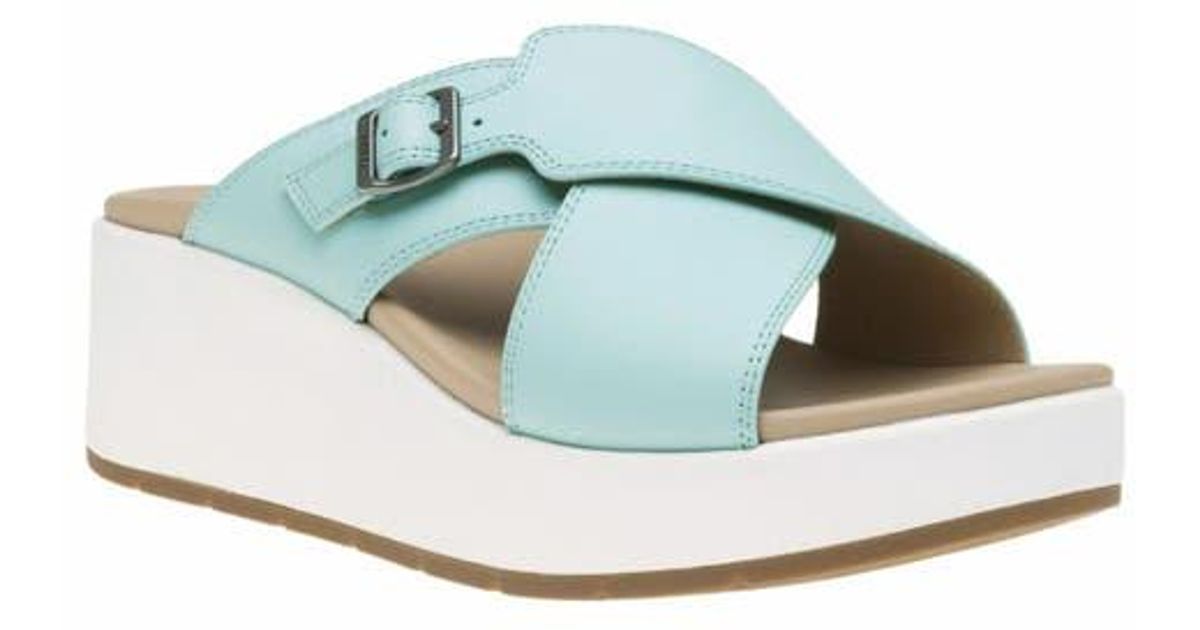 ABEO Solstice Cross Slide in Blue | Lyst