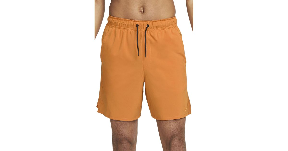 Nike Dri-fit Unlimited 7-inch Unlined Athletic Shorts in Orange for Men ...