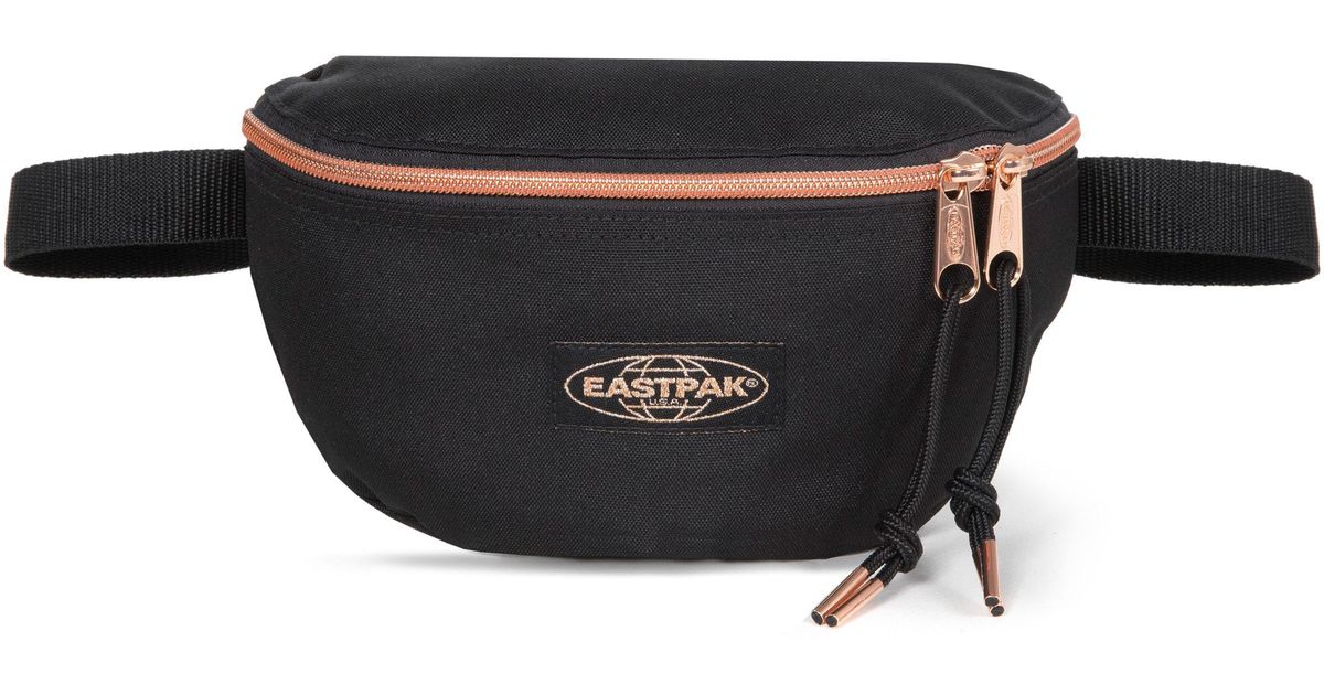 eastpak gold out black
