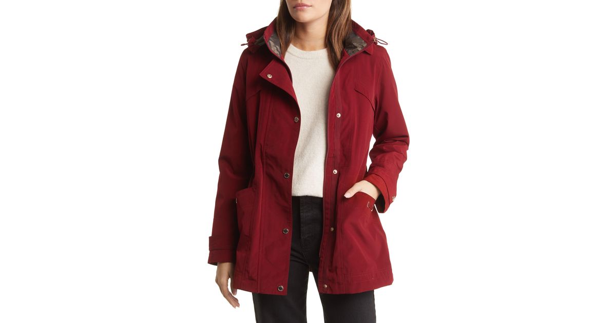 Gallery Cinched Waist Hooded Raincoat in Red Lyst