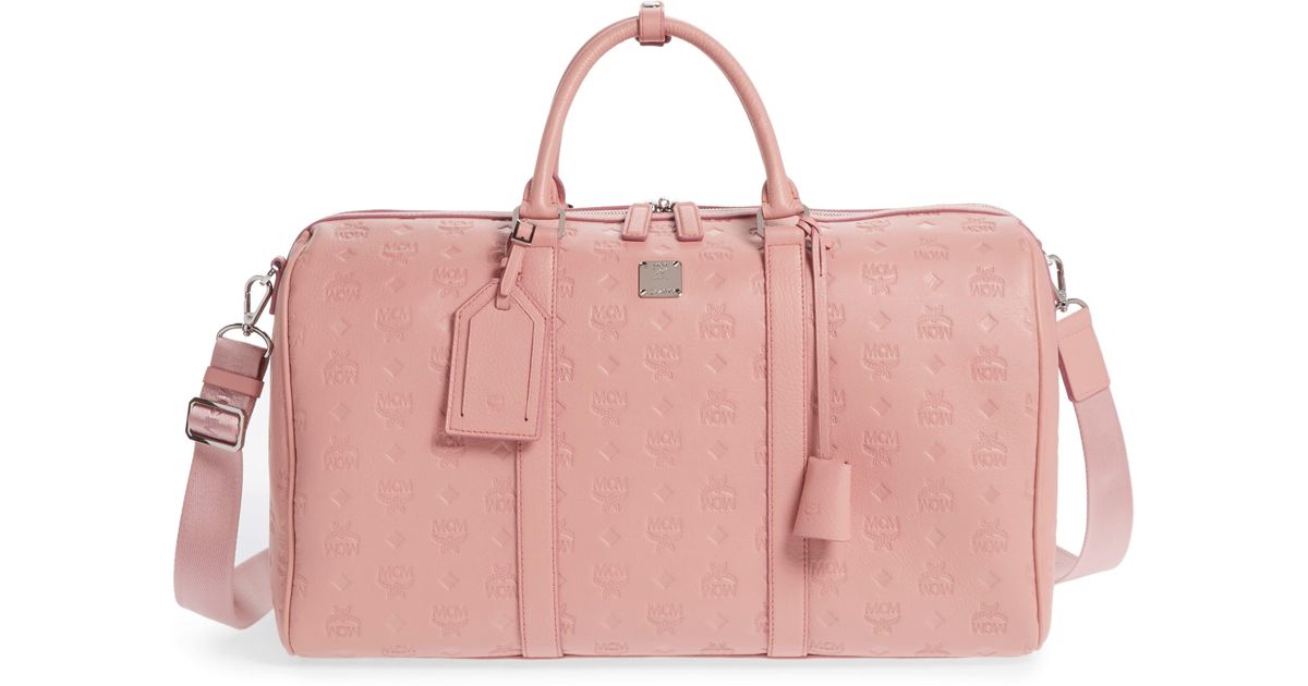 pink mcm duffle bag
