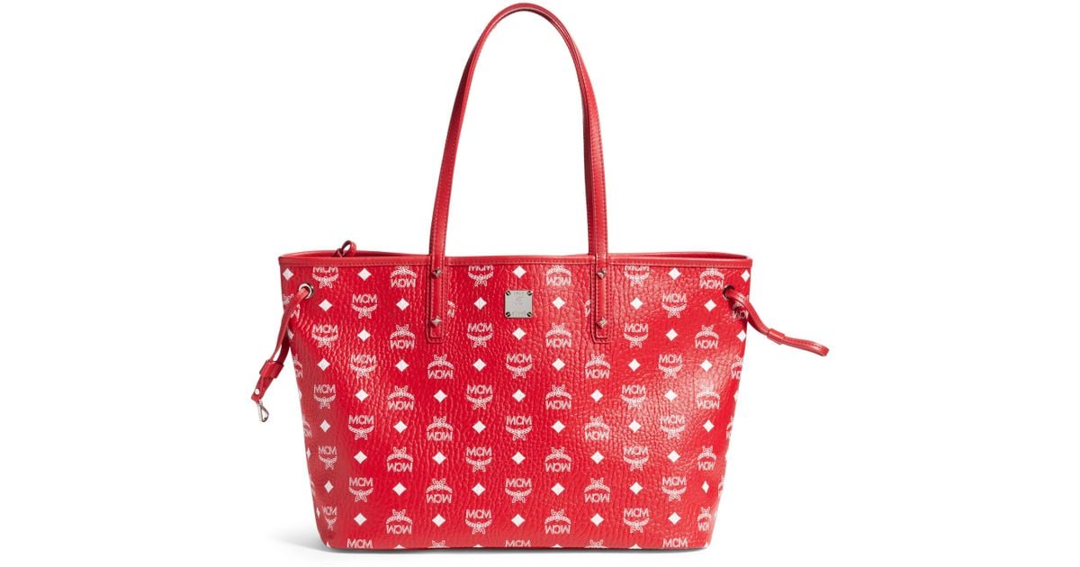 red mcm tote bag