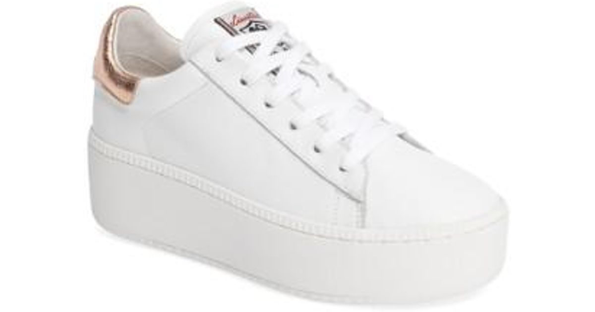 white platform wedge sneakers