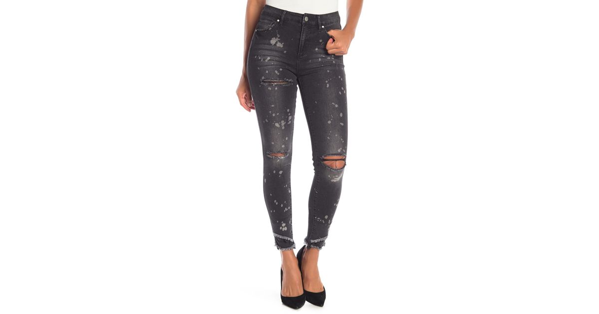 black ripped jeans garage