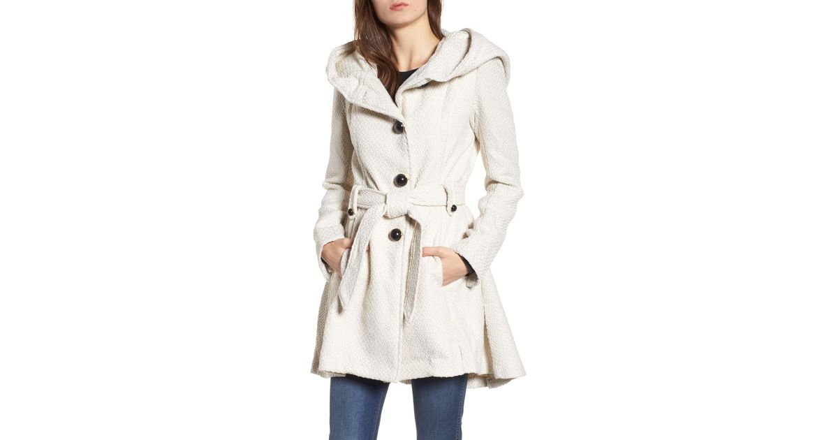 white skirted coat