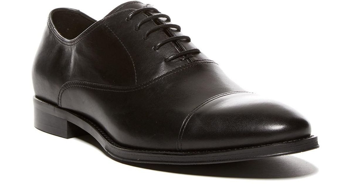 gordon rush medallion cap toe derby