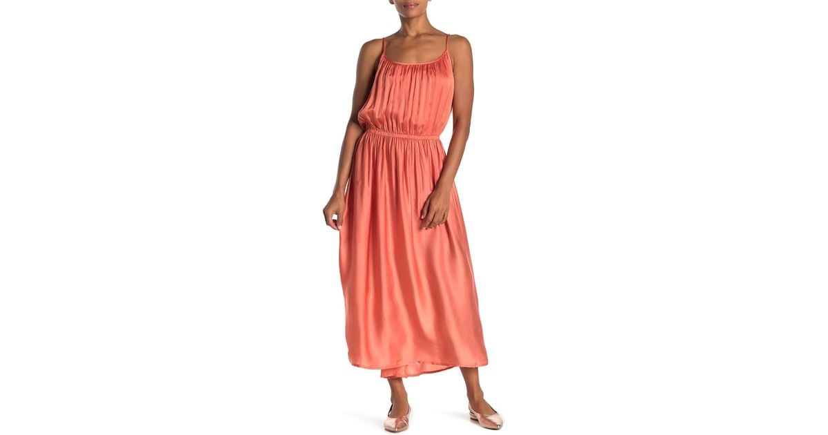 orange pleated maxi dress