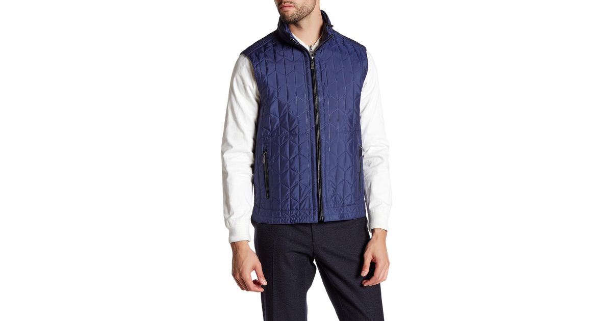 blue hooded vest