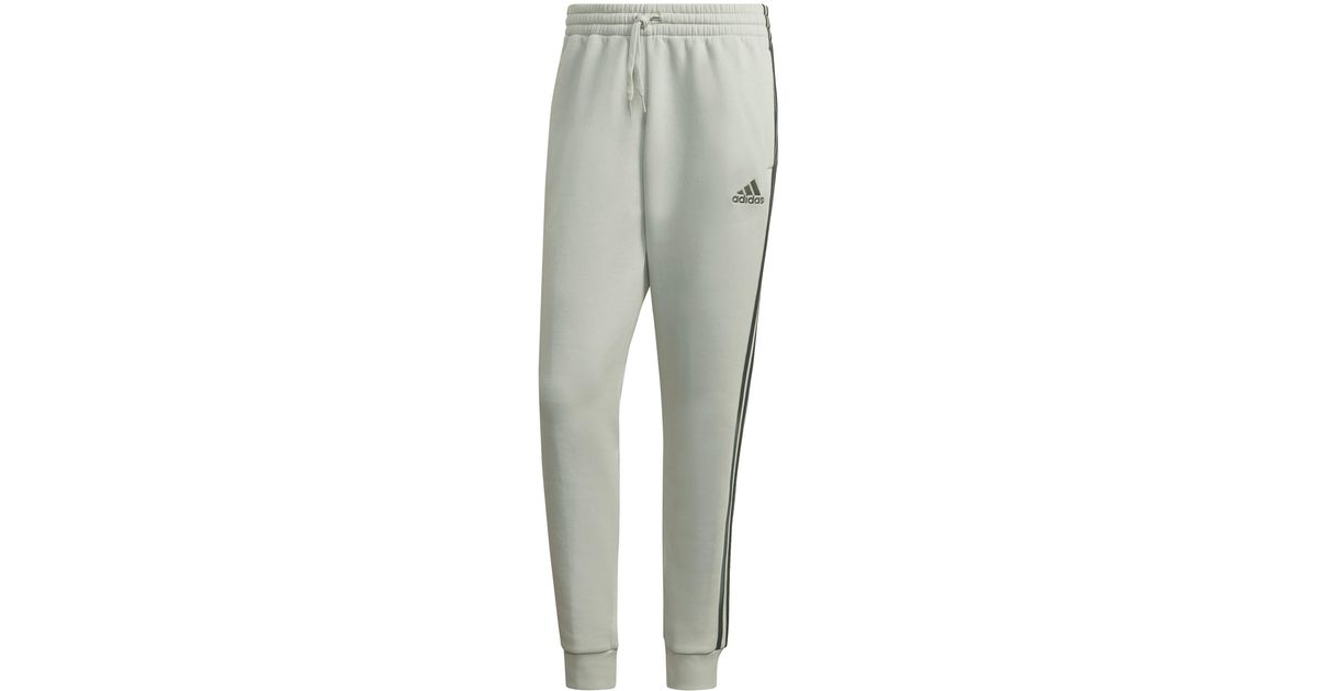 adidas Essentials French Terry Tapered-cuff 3-stripes Pants In Linen Green/green Oxide At
