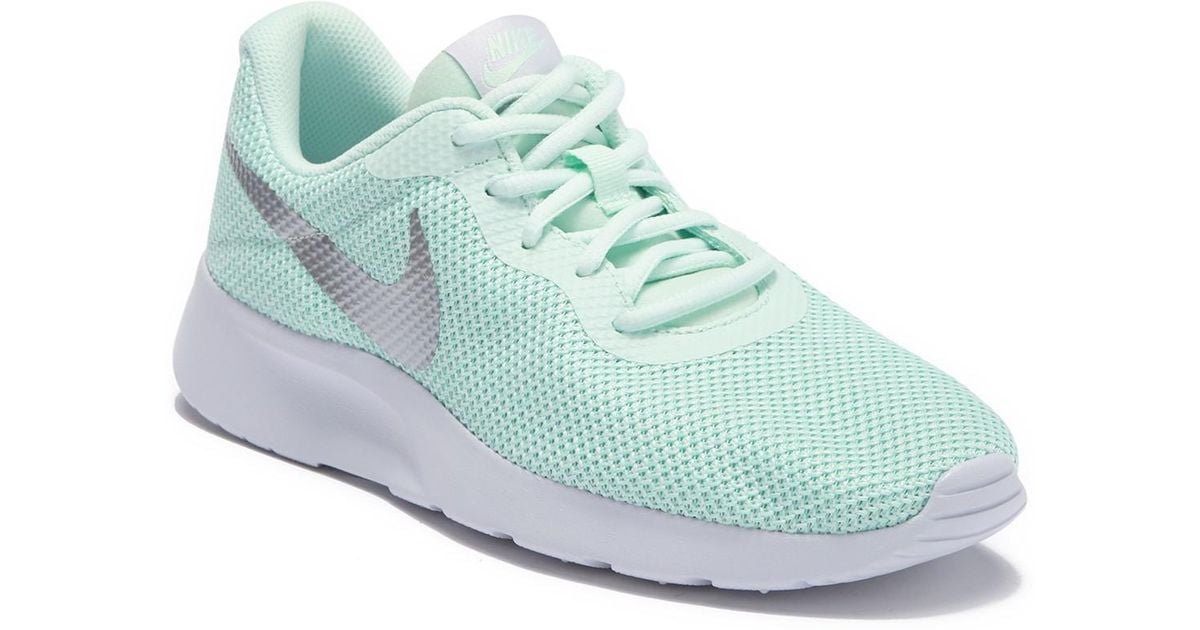 teal nike tanjun