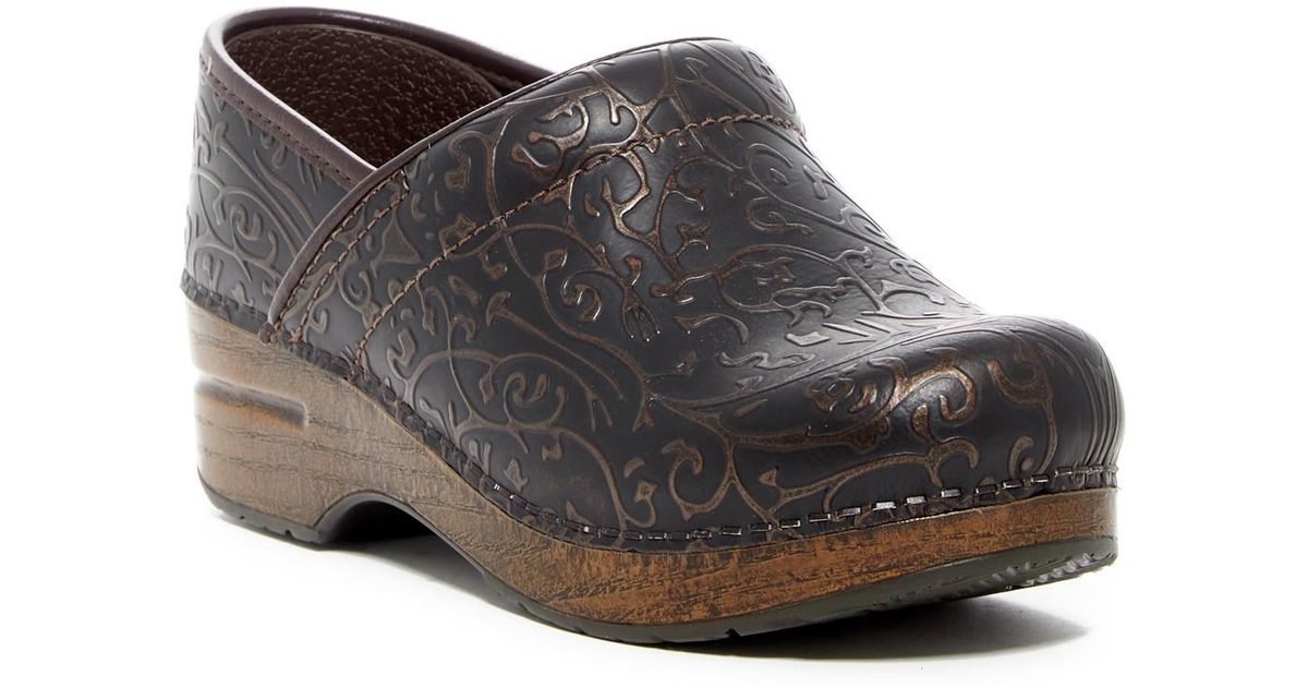 dansko embossed clogs