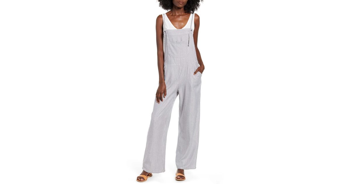 wild honey pinstripe flared dungaree jumpsuit