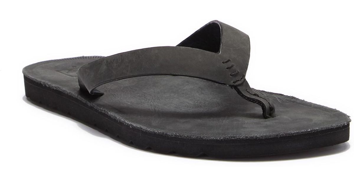 reef black leather flip flops