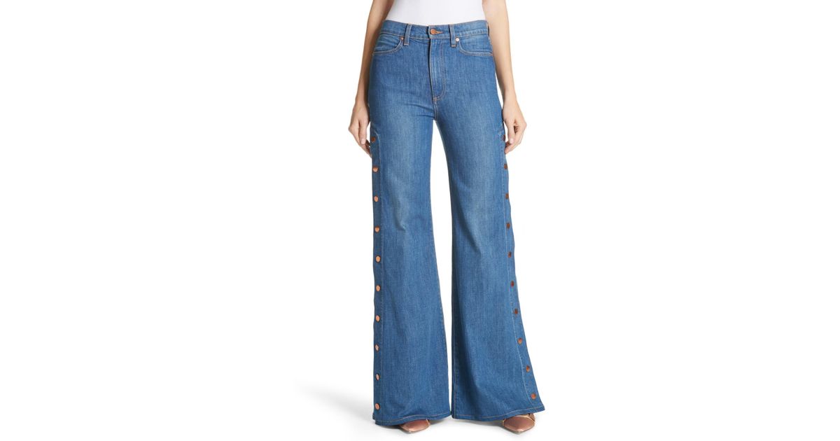Alice + Olivia Gorgeous Snap Side Flare Leg Jeans in Blue | Lyst