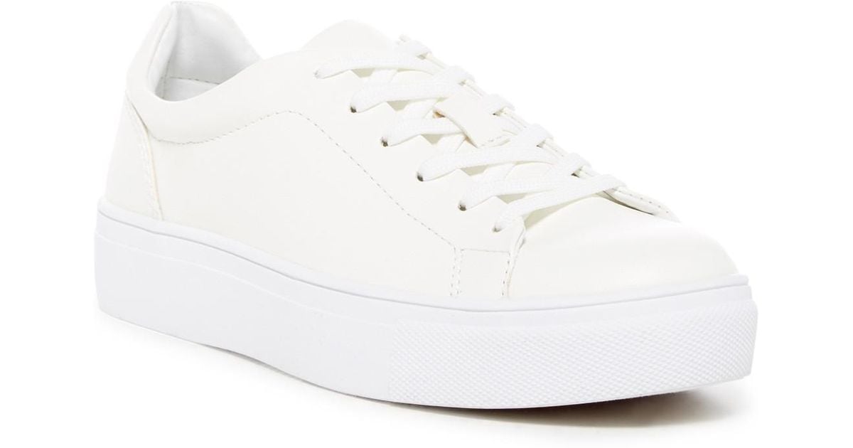 girl white tennis shoes