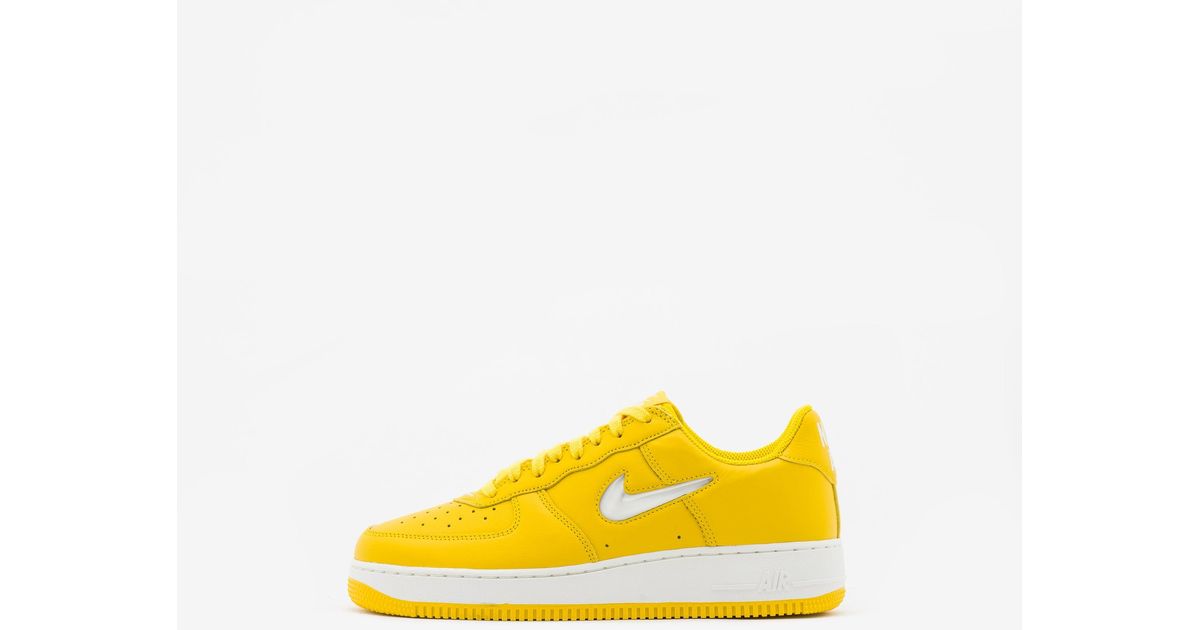 white and yellow air force 1
