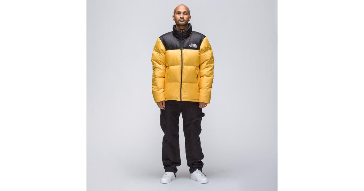 the north face puffer jacket yellow