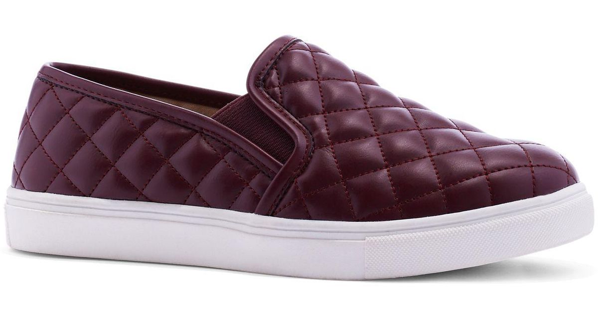 black quilted slip on shoes