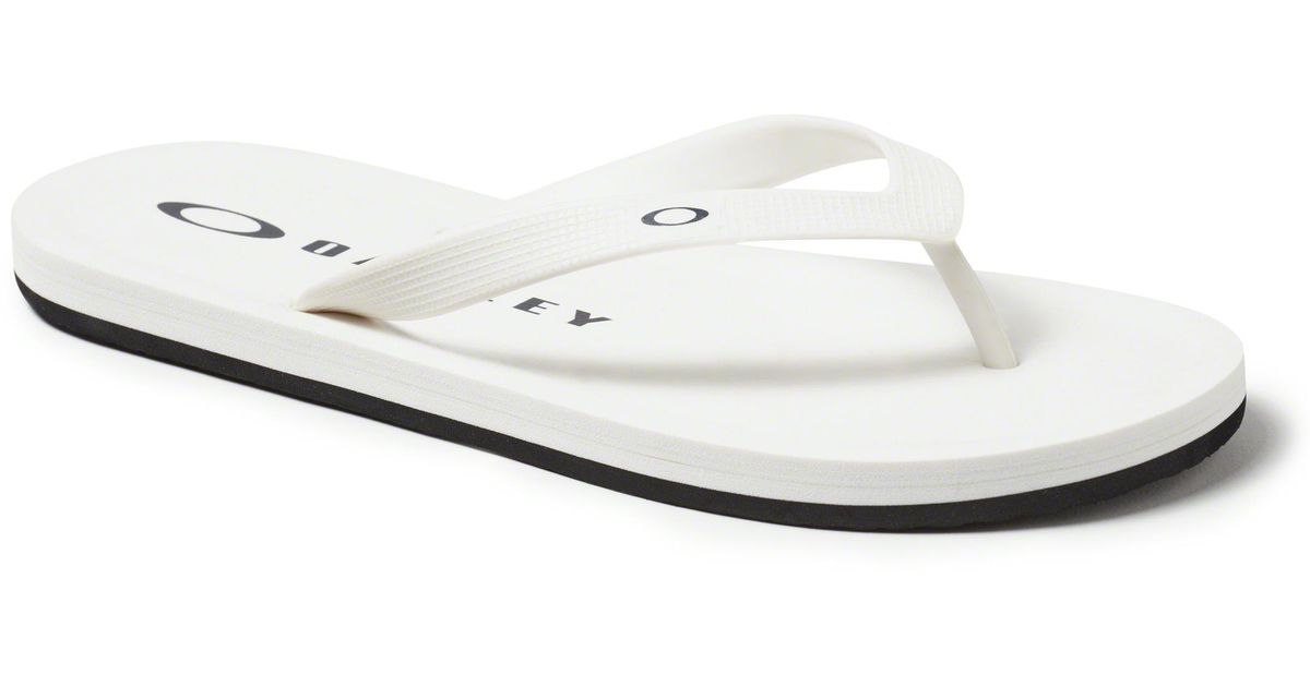 white oakley flip flops