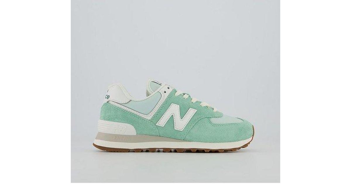 New Balance 574 Trainers in Green Lyst
