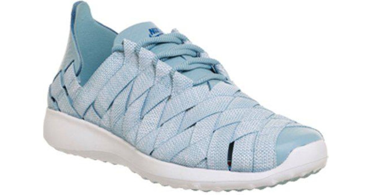 nike women's juvenate woven