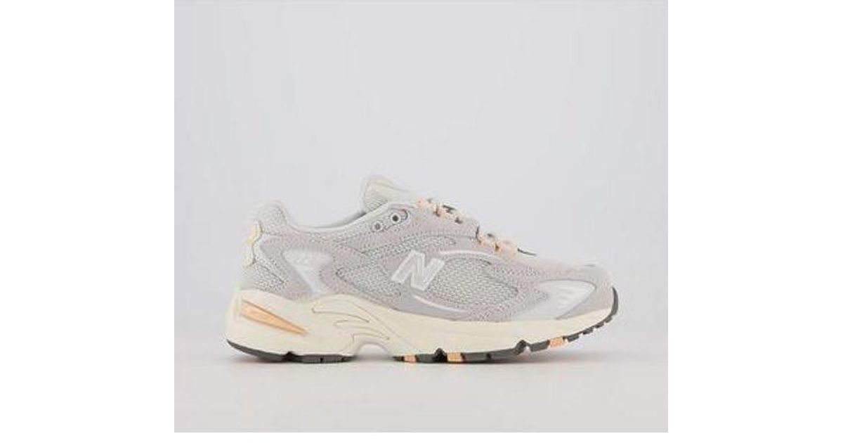 new balance 725 leather and mesh trainers