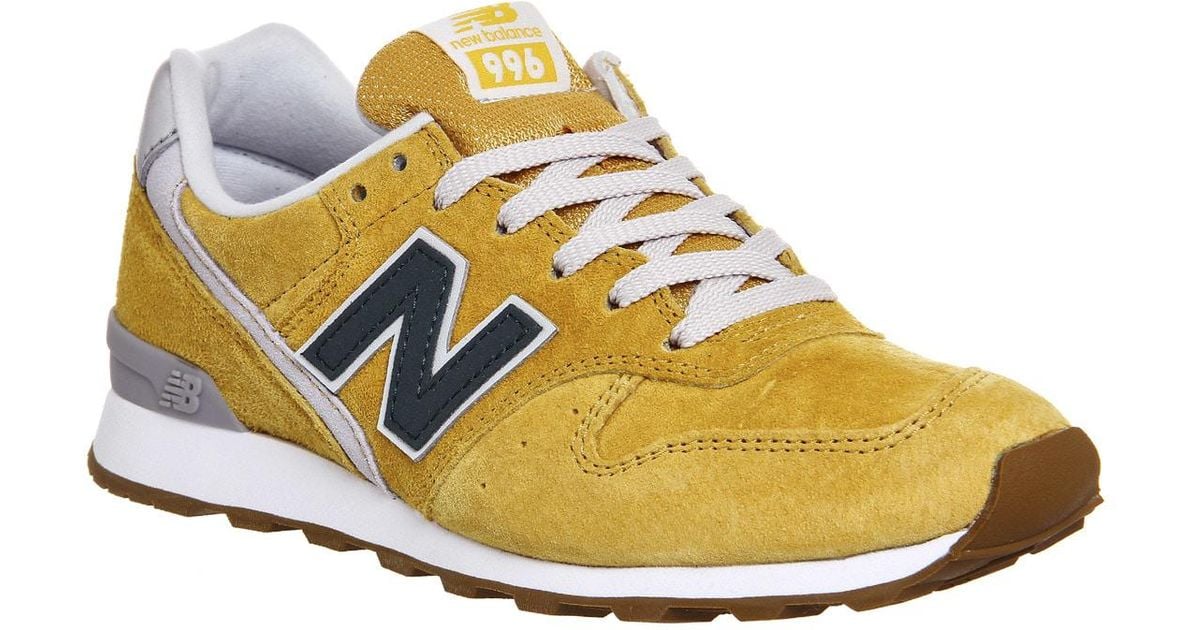 new balance yellow trainers