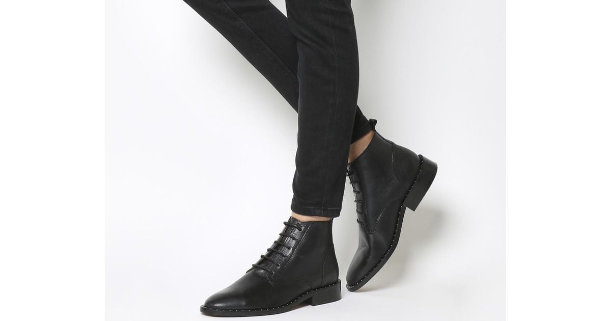 black lace up boots with studs