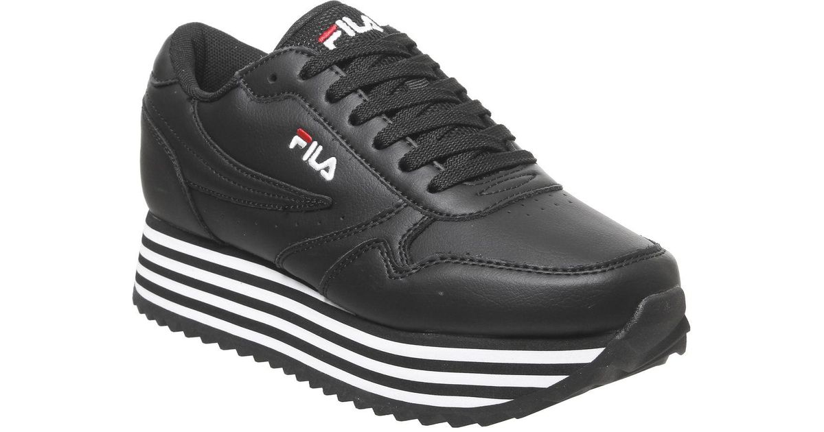 white trainers black stripe
