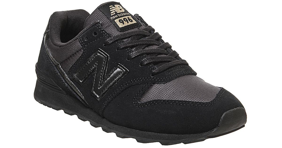 new balance black gold trainers