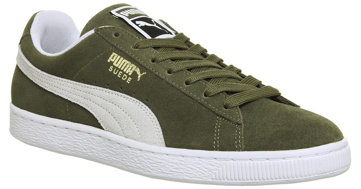 green suede puma sneakers