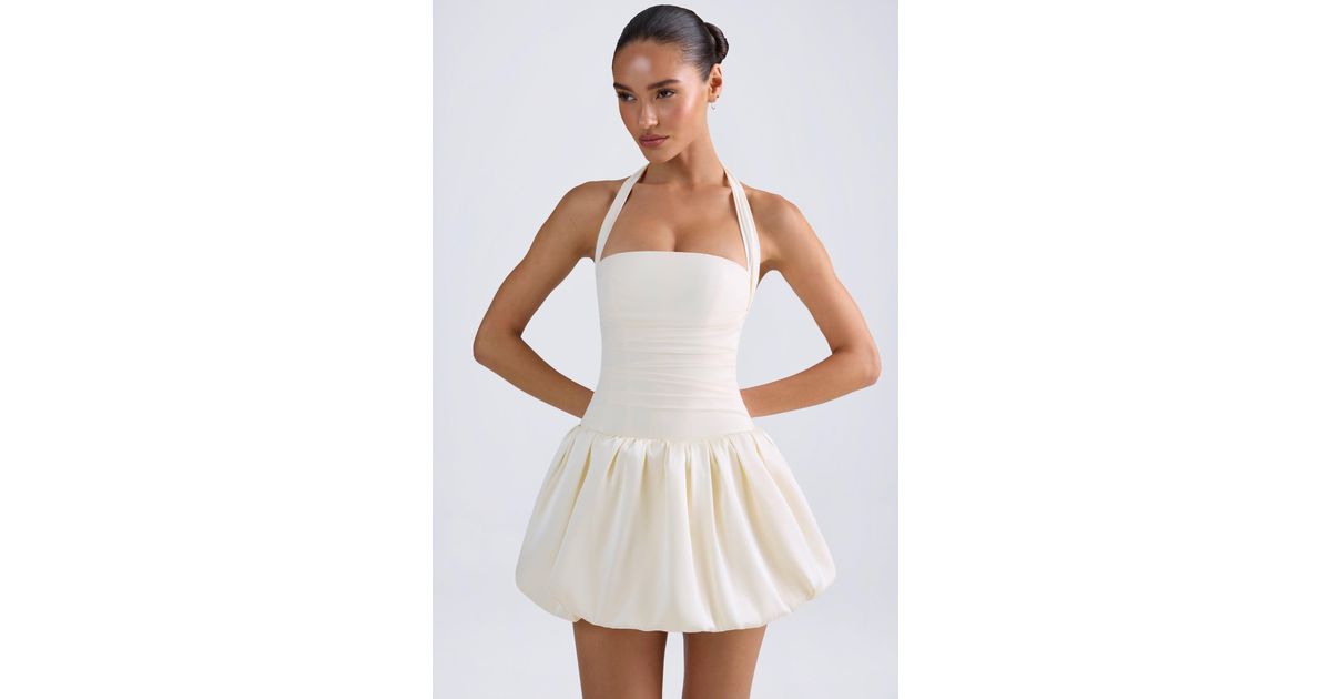halterneck lace-up bubble hem corset micro mini dress in ivory Oh Polly Ludmila halterneck bubble hem corset mini dress in ivory