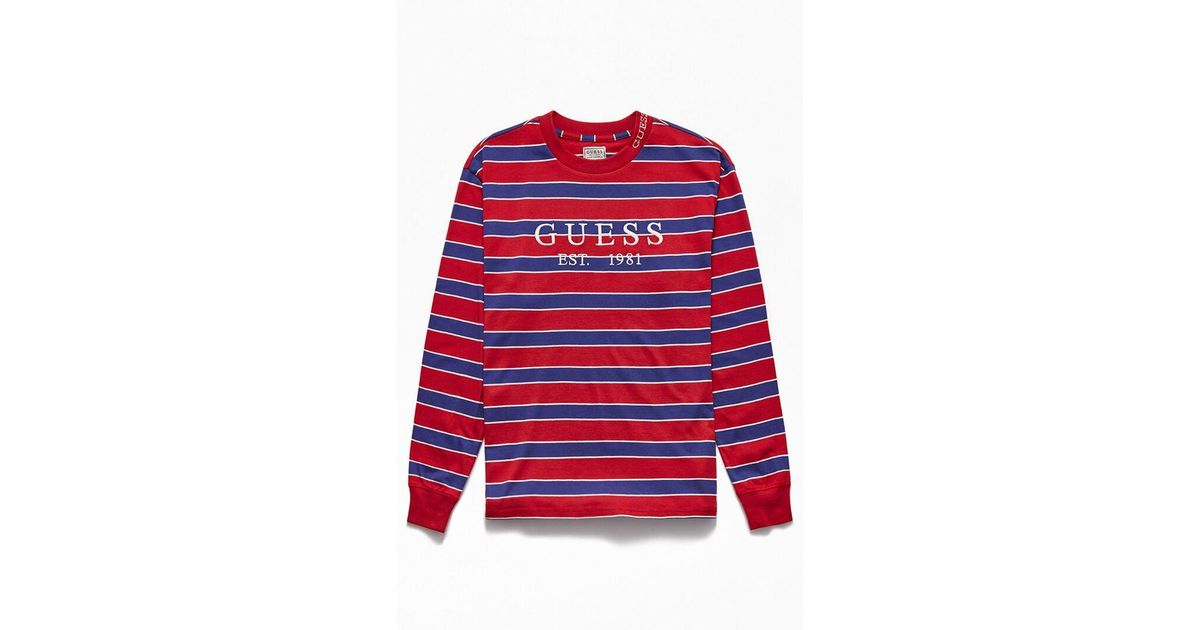 red and white guess shirt
