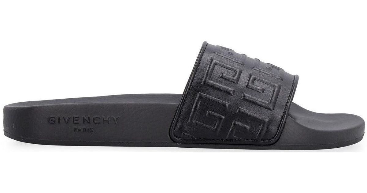 Womens Shoes Flats and flat shoes Flat sandals Givenchy Leather 4g Logo Embossed Sandals in Black 