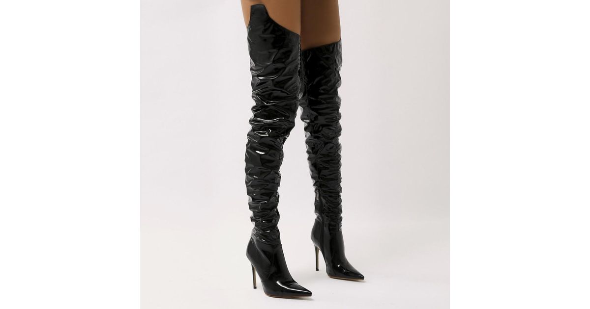 black vinyl thigh high boots