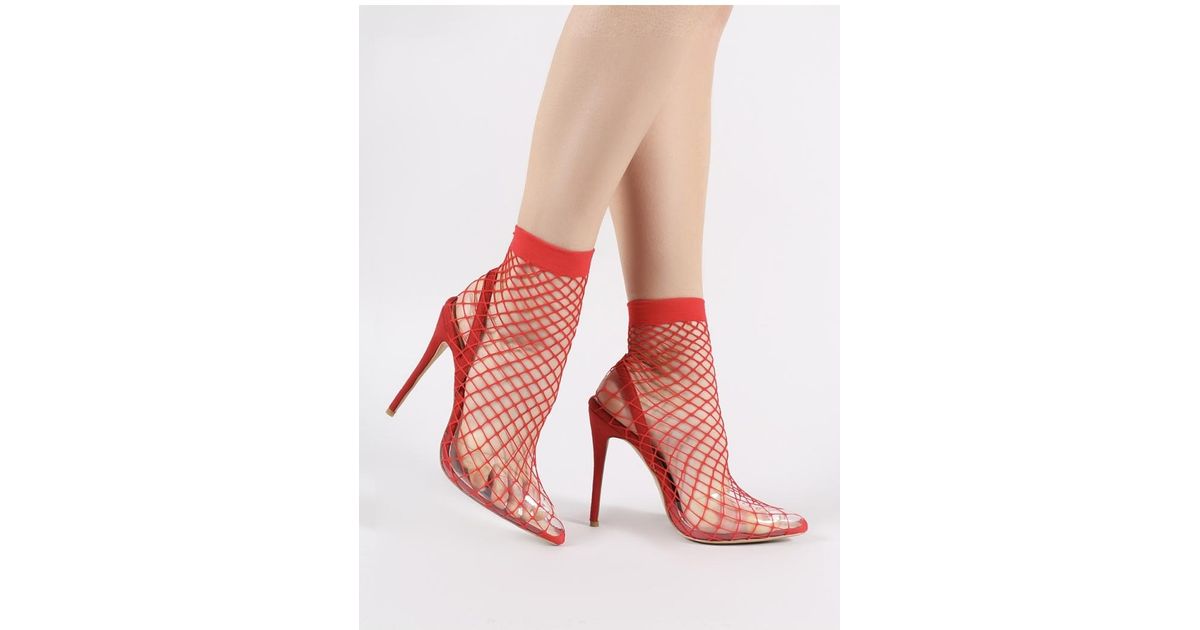 perspex fishnet heels