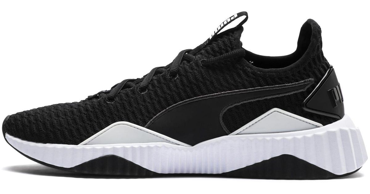 puma defy herren
