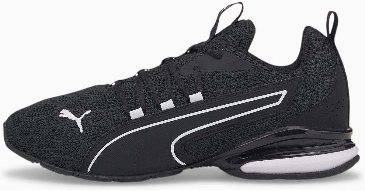 puma axelion black and white