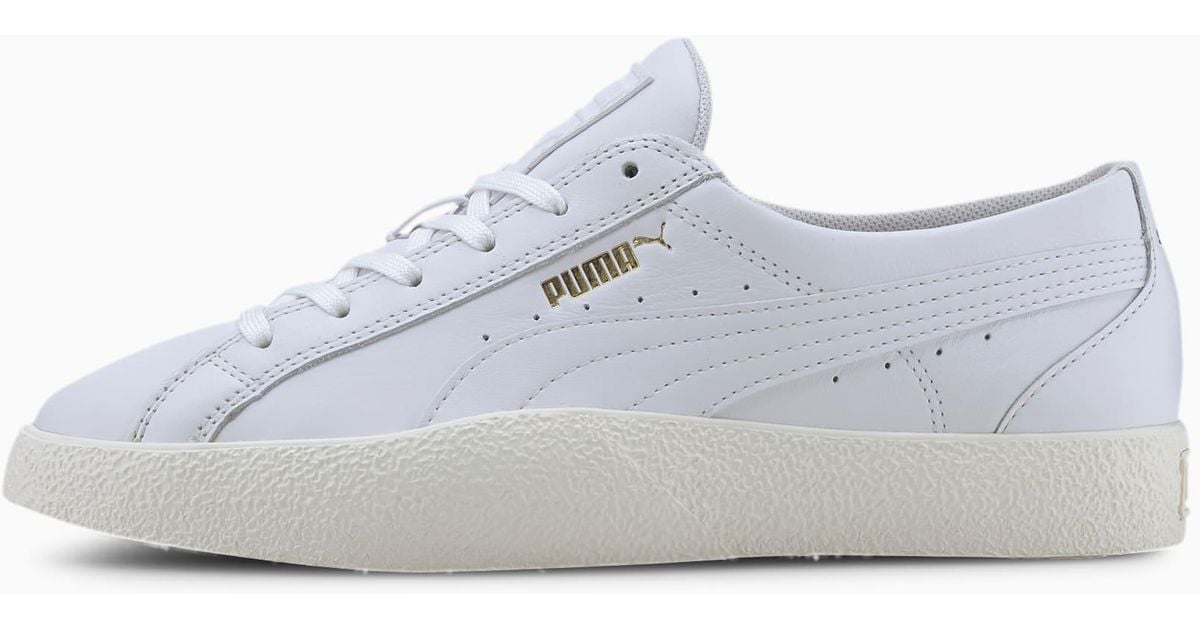white low top pumas